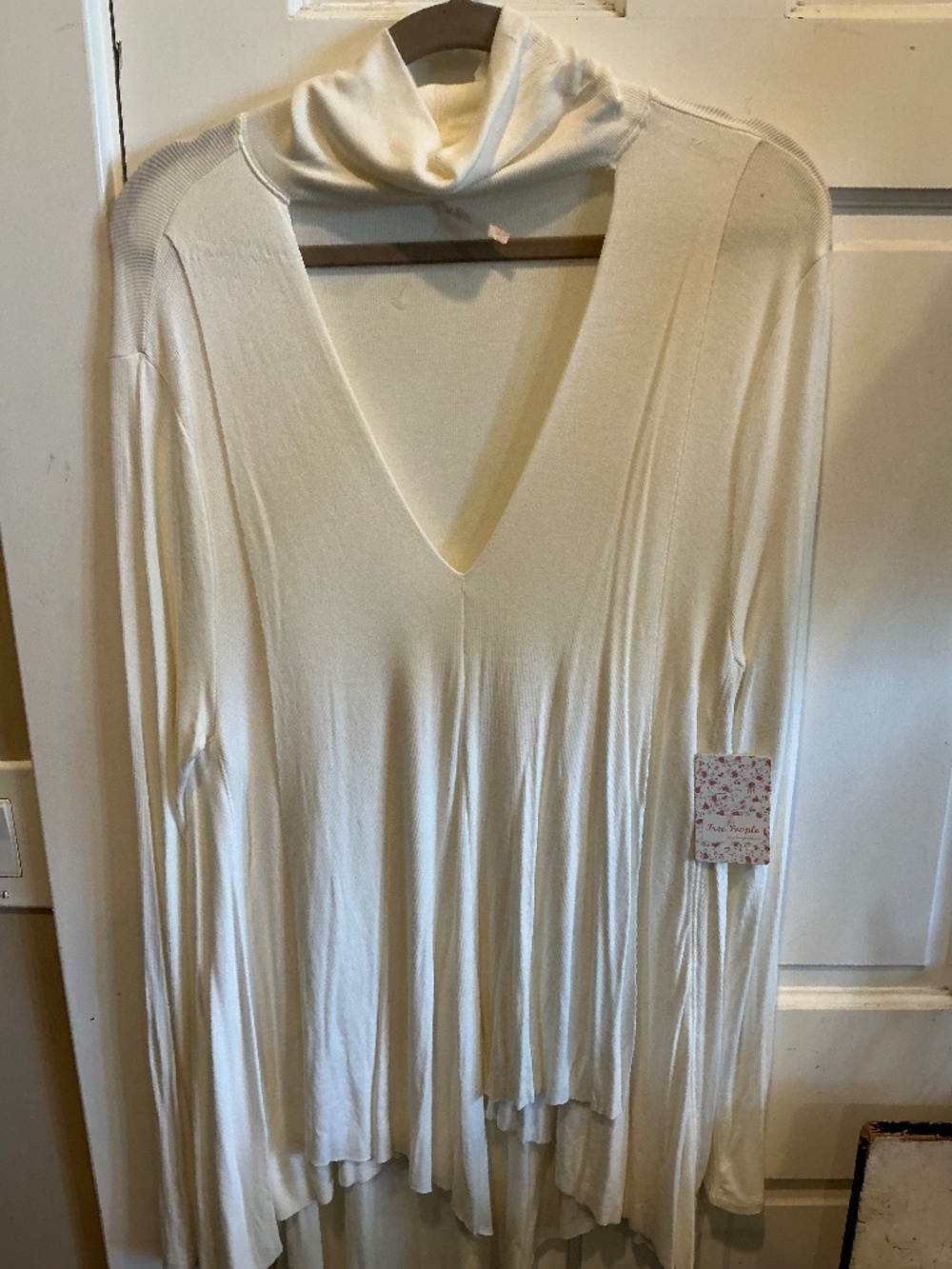 Free people tunic top in dreamy creamy white! Brand new with tags. Size large